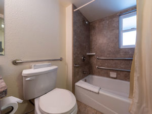 Two bedroom condo at Tahoe Sands Resort. Master bathroom with shower tub and toilet with grab bars
