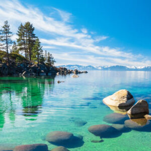 Lake Tahoe shoreline with rocks and trees