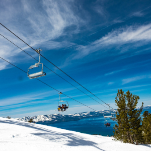 ski resort chairlift with Lake Tahoe in background