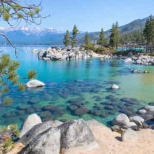 Lake Tahoe beach with colorful water